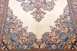 Backside of handmade 2000s Sarough rug showing knot structure and weave density