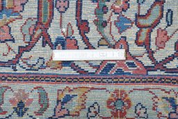 Corner detail of 2000s Sarough rug showing border pattern and Wool pile