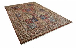 Corner detail of 2000s Sarough rug showing border pattern and Wool pile