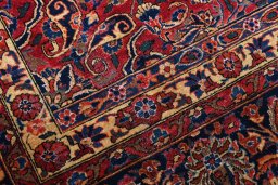 Corner detail of 1930s Sarough rug showing border pattern and Cork pile