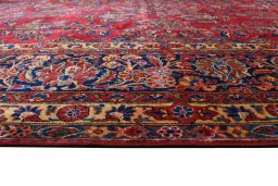 Backside of handmade 1930s Sarough rug showing knot structure and weave density