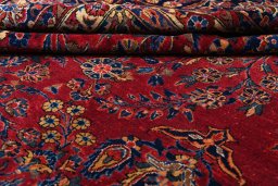 Corner detail of 1930s Sarough rug showing border pattern and Cork pile