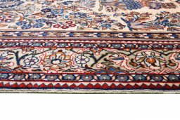 Corner detail of 2000s Sarough rug showing border pattern and Wool pile