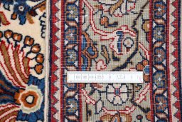 Backside of handmade 2000s Sarough rug showing knot structure and weave density