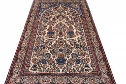 Surface texture of 2000s Sarough rug with natural Wool and intricate pattern