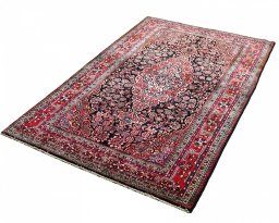 Close-up detail of 2000s Sarough rug from Iran / Persia showing Wool weave
