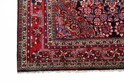Close-up detail of 2000s Sarough rug from Iran / Persia showing Wool weave