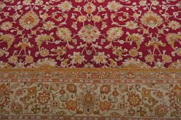 Backside of handmade 1950s Sarough rug showing knot structure and weave density