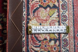 Surface texture of 1970s Sarough rug with natural Wool and intricate pattern