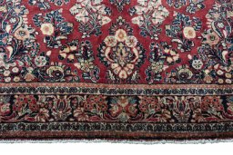 Close-up detail of 1970s Sarough rug from Iran / Persia showing Wool weave