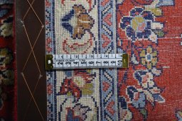 Backside of handmade New Sarough rug showing knot structure and weave density