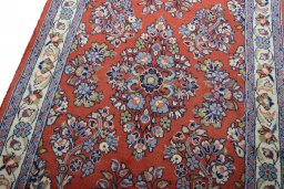 Backside of handmade New Sarough rug showing knot structure and weave density