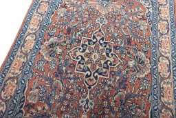 Backside of handmade 2000s Sarough rug showing knot structure and weave density