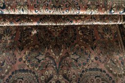 Close-up detail of 1930s Sarough rug from Iran / Persia showing Wool weave