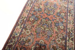 Backside of handmade New Sarough rug showing knot structure and weave density
