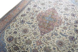Backside of handmade New Sarough rug showing knot structure and weave density