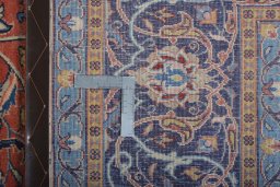 Backside of handmade New Sarough rug showing knot structure and weave density