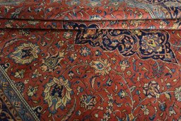 Close-up detail of 2000s Sarough rug from Iran / Persia showing Wool weave