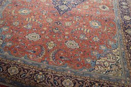 Close-up detail of 2000s Sarough rug from Iran / Persia showing Wool weave