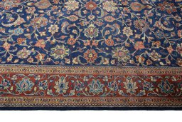 Corner detail of 1970s Sarough rug showing border pattern and Wool pile