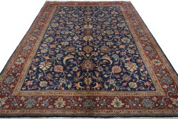 Surface texture of 1970s Sarough rug with natural Wool and intricate pattern