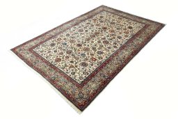 Corner detail of 2000s Sarough rug showing border pattern and Wool pile