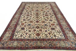 Surface texture of 2000s Sarough rug with natural Wool and intricate pattern
