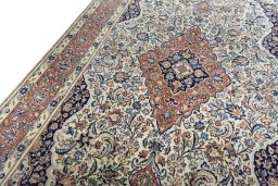 Backside of handmade New Sarough rug showing knot structure and weave density