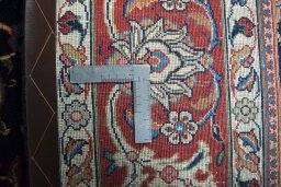 Backside of handmade New Sarough rug showing knot structure and weave density