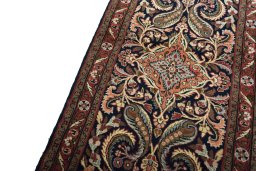 Backside of handmade New Sarough rug showing knot structure and weave density