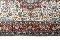 Corner detail of 2000s Sarough rug showing border pattern and Wool pile