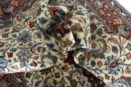 Surface texture of 2000s Sarough rug with natural Wool and intricate pattern