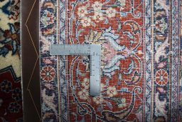 Backside of handmade 2000s Sarough rug showing knot structure and weave density