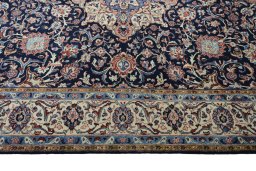 Corner detail of 2000s Sarough rug showing border pattern and Wool pile