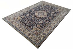 Corner detail of 2000s Sarough rug showing border pattern and Wool pile