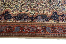 Corner detail of New Sarough rug showing border pattern and Wool pile