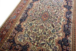 Backside of handmade New Sarough rug showing knot structure and weave density