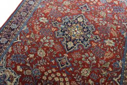 Backside of handmade New Sarough rug showing knot structure and weave density