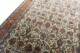 Backside of handmade New Sarough rug showing knot structure and weave density