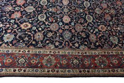 Corner detail of 1970s Sarough rug showing border pattern and Wool pile