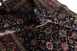 Surface texture of 1970s Sarough rug with natural Wool and intricate pattern