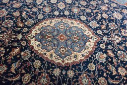 Central medallion detail of New Sarough rug from Iran / Persia