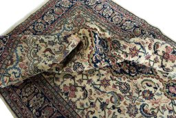 Surface texture of New Sarough rug with natural Wool and intricate pattern