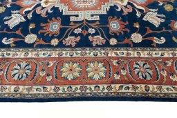 Corner detail of New Sarough rug showing border pattern and Wool pile