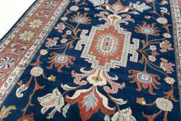 Backside of handmade New Sarough rug showing knot structure and weave density