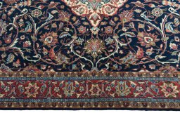 Corner detail of 2000s Sarough rug showing border pattern and Wool pile