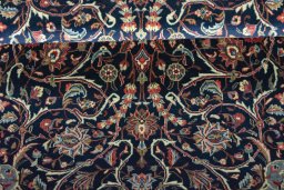 Close-up detail of 2000s Sarough rug from Iran / Persia showing Wool weave