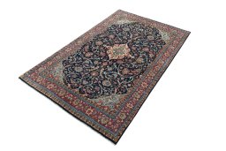 Corner detail of 2000s Sarough rug showing border pattern and Wool pile