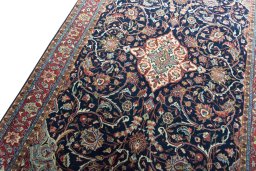 Backside of handmade 2000s Sarough rug showing knot structure and weave density