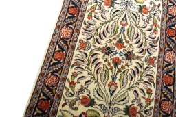 Backside of handmade New Sarough rug showing knot structure and weave density